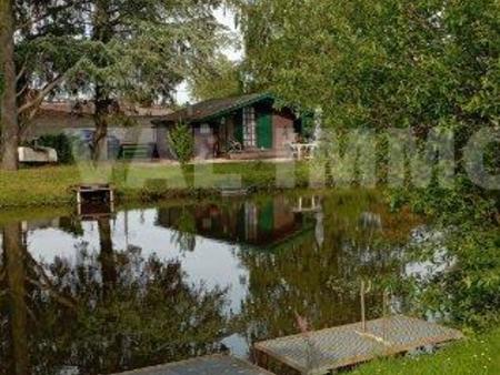 chalet de loisirs vue sur etang de peche