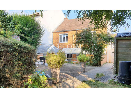 maison semi-individuelle  3 chambres  beau jardin et garage