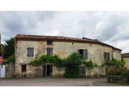 nord ouest cahors. batiment à restaurer avec appartement t2 loué et local loué