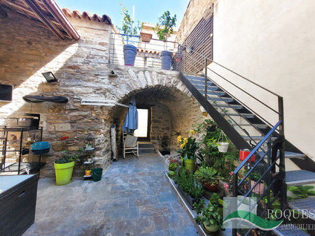 a vendre  faugeres  belle maison rénovée   cour  terrasse 