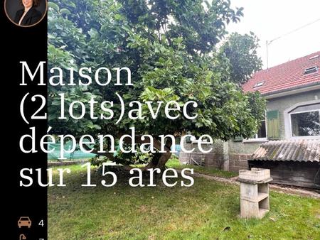 maison individuelle comprenant 2 appartements  un logement attenant le tout sur 18 ares