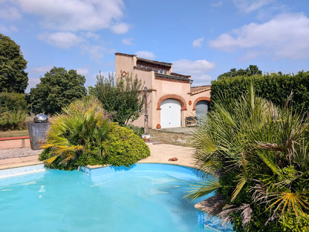 maison de plain pieds avec garages et piscine