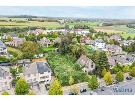 bouwklare grond voor open bebouwing nabij centrum asse