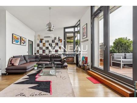 appartement moderne de standing avec terrasse de plain pied végétalisée et vue dégagée sur