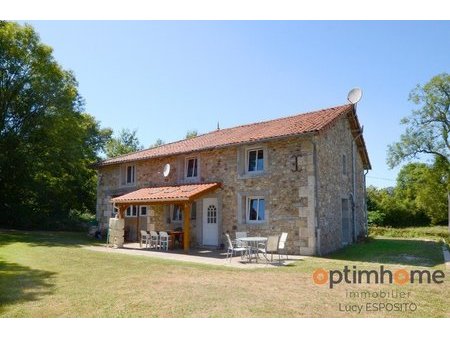 belle maison en pierre avec jardin et garage