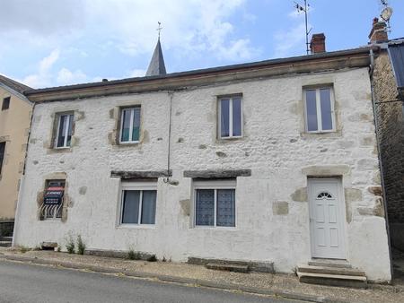 grande maison de bourg avec garage et terrain