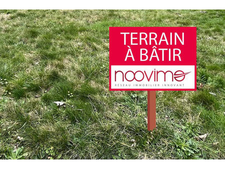 terrain constructible à guécélard au calme