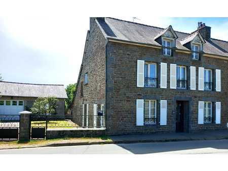 maison de 3 chambres avec un grand garage et un agréable jardin  dans un village paisible