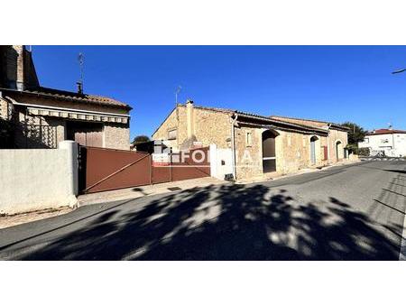 2 maisons  un garage  une cours et un hangar de 112m2