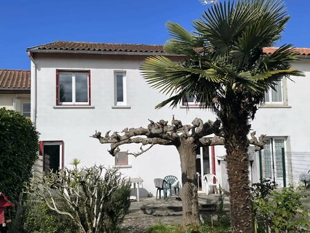 maison de ville avec garage et jardin