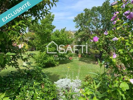 maison entretenue avec superbe jardin