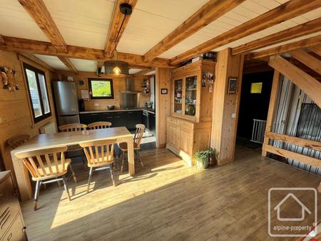 chalet  2 chambres  mezzanine  salon  abri voiture  cave  jardin  vue sur les aravis