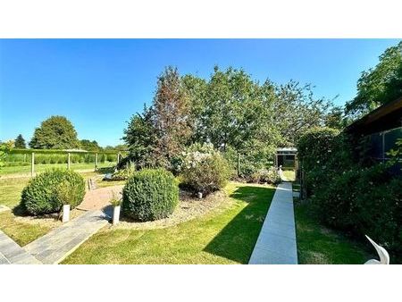 spacieux bungalow avec 3 chambres et jardin orienté sud