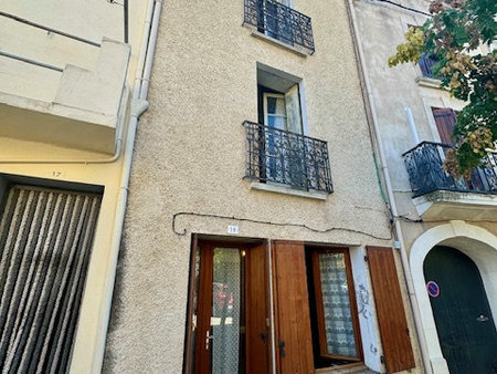 alignant du vent  maison de ville avec terrasse et garage.