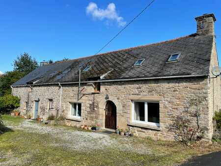 longère traditionnelle en pierre comprenant deux maisons et un cottage séparé supplémentai