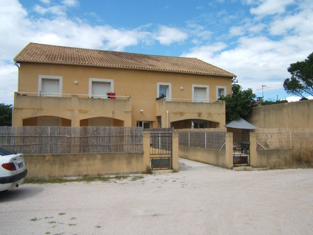 immeuble de 5 appartements et 5 garages loues / a vendre