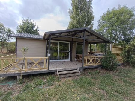 chalet en bois avec terrasse couverte  3 chambres