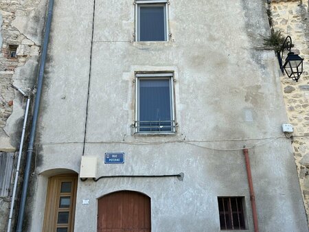 dans le centre de bourg saint andéol  immeuble rénové