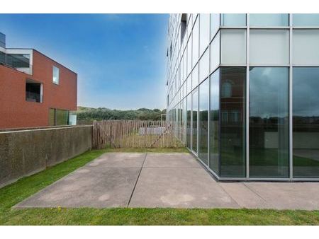 appartement au rez-de-chaussée avec jardin fantastique à ost