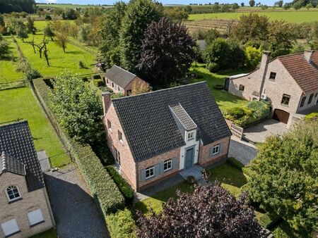 knappe pastorijwoning op een prachtig perceel van maar liefst 40a