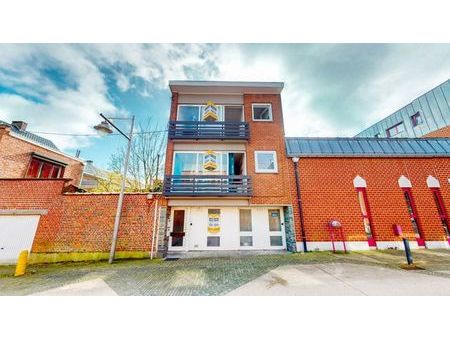 entrepôt + 2 appartements ( 2ch ) dans le centre de manage !