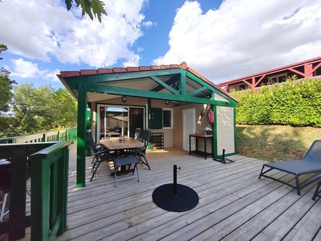 chalet avec grande terrasse + terrain dans un parc de loisir résidentiel à 8 minutes de au