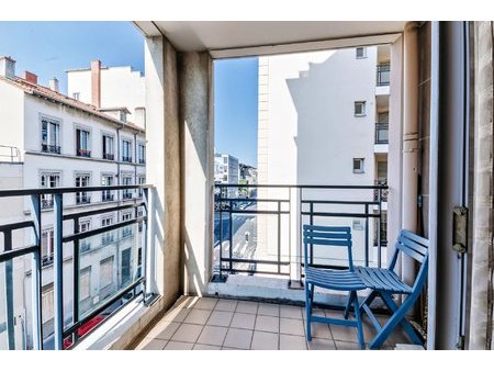 charmant t3 traversant de 72 m² avec balcon  garage box et cave – lyon 7ème